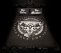 A black duvet blanket cover featuring custom Blackcraft artwork